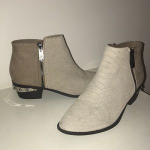 Leather ankle booties with metal spike detail